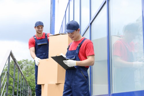 Packed office equipment prepared for relocation services in Hammersmith