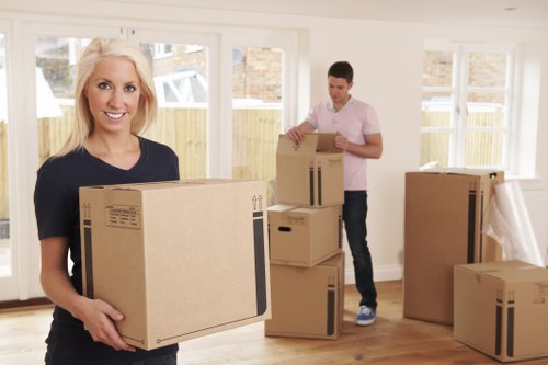 Packed moving boxes ready for a flat removal in Hammersmith apartment